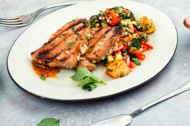 istock Tuna steak fried with grilled vegetables. 1562278582