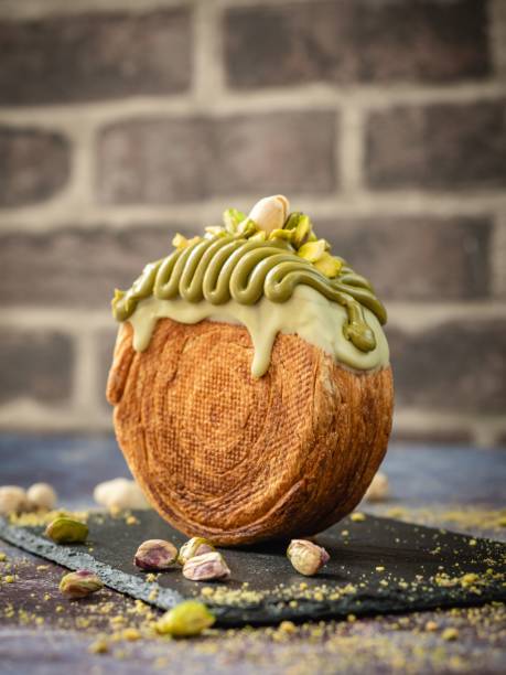 Vertical closeup of a New York Roll with pistachio