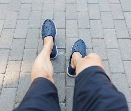 Men Wear Sandal Sitting on outdoor