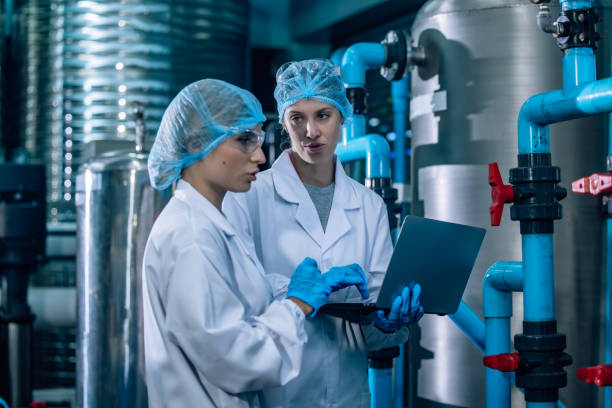 istock Water Quality Officer assesses RO systems, ensuring standards, safety and control the contamination 1562378957