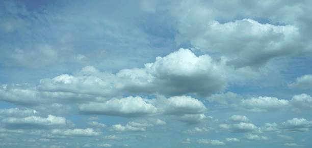 istock A blue sky backgrounds and textues with a white clouds. 1562385893