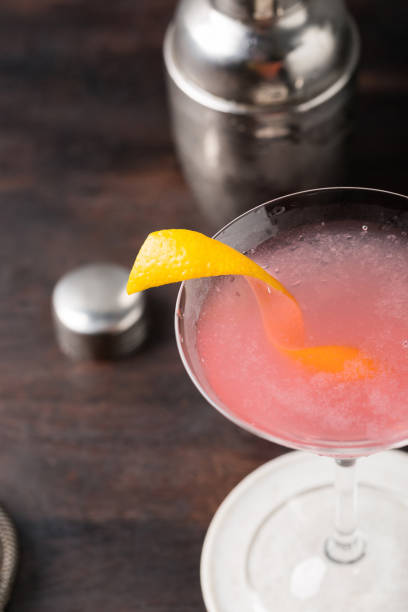 istock Classic Cosmopolitan Cocktail alcoholic gin, triple sec liqueur, fresh lemon juice and raspberry syrup 1562409947