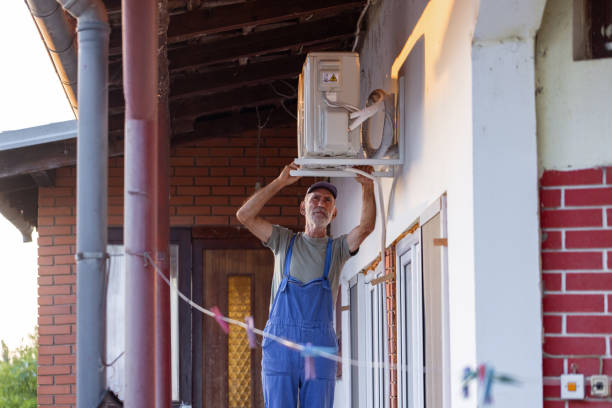 istock Working on an outdoor AC unit 1562429744