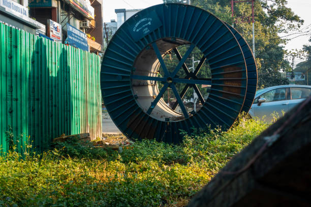 June 28th 2023, Uttarakhand, India. A big roll of underground communication cable along side road.