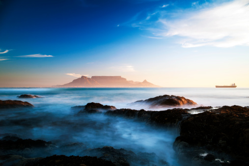 View of Table Mountain from Bloubergstrand, South Africa, Long exposure, grain added for effect.