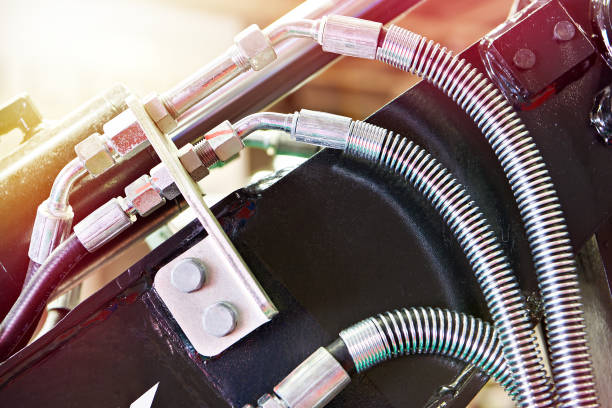 istock Hoses of hydraulic machine 1562523893