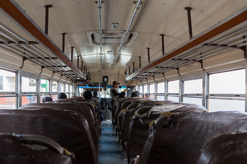 Solola, Guatemala - November 14, 2017: Interior Of Chicken Bus in Guatemala. People Are Traveling with Public Transport Because of Cheap Tickets.