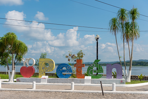 Flores, Guatemala - November 15, 2017: Flores Island Cityscape in Guatemala. You Love Peten Sign.