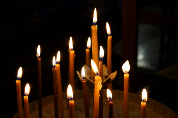 istock Burning candles in an Orthodox church 1562581817