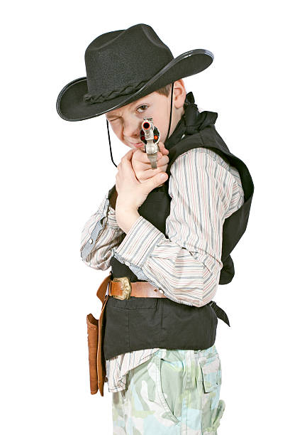 istock Boy as a cowboy with pistol 156258615