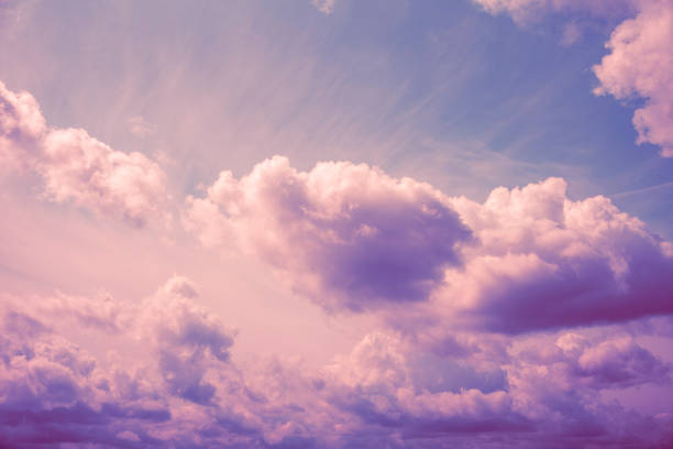 istock Surreal sky purple pink clouds summer fantasy 1562592275