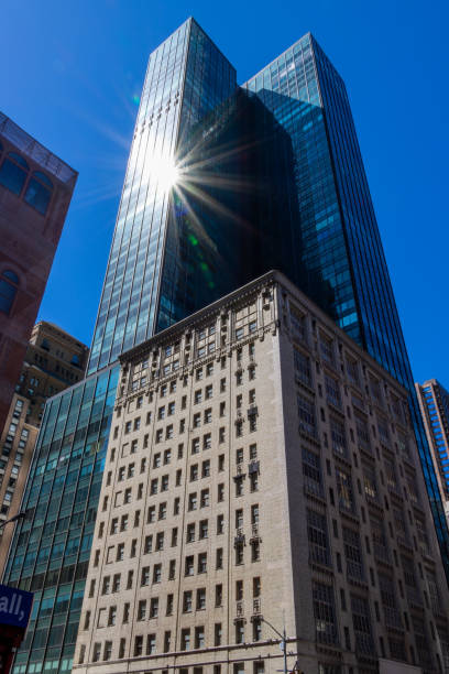 istock Sun light is reflecting on a high rise in Manhattan. 1562597109