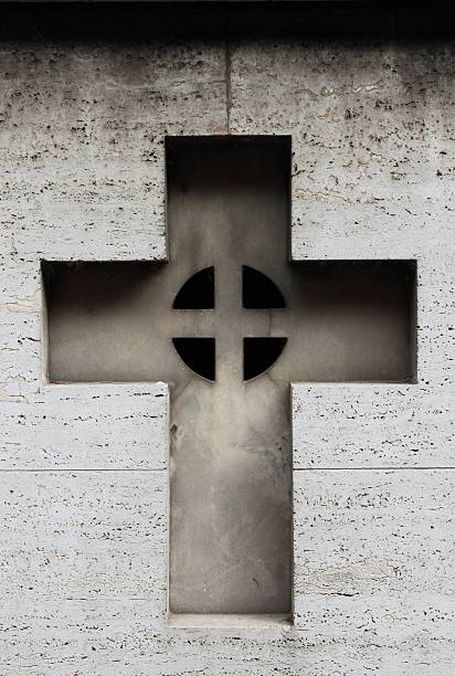 istock Carved cross gravestone 156260144