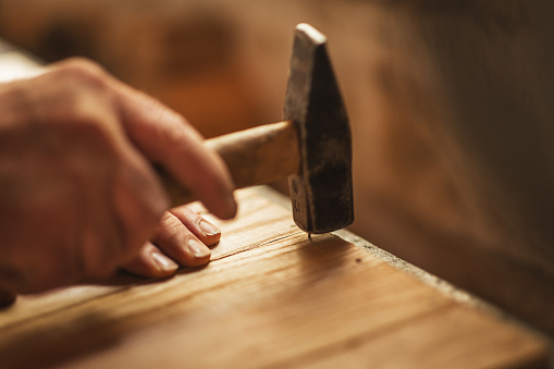 Carpenter - Woodworking - In the workshop - Small business - Stock Photo