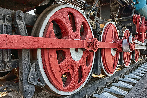 istock Old steam locomotive wheels 156262875