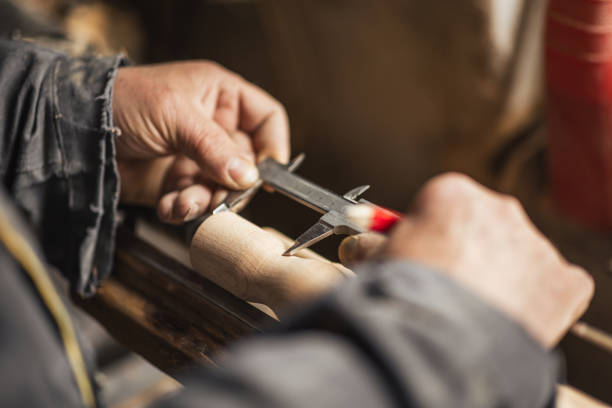 Carpenter - Woodworking - In the workshop - Small business - Stock Photo