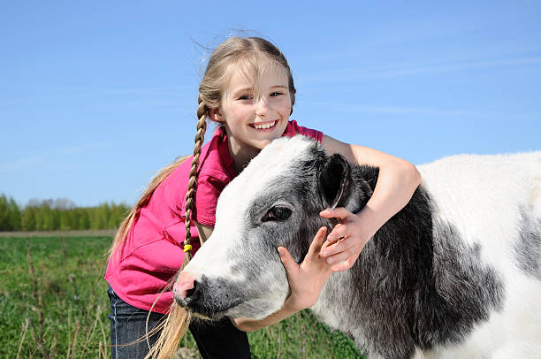 Girl with a cow