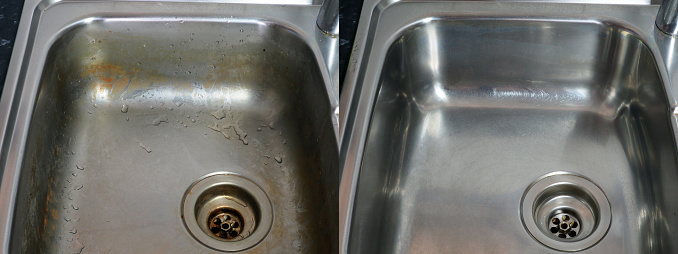 Stainless Steel Sink. Photo of Comparison Before and After Cleaning.