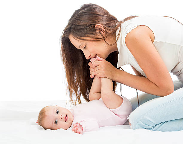 istock happy mother playing with her baby infant 156266237
