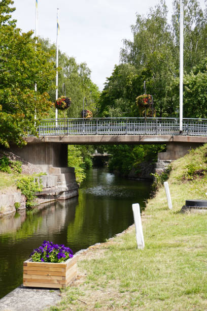 istock a bridge over a canal in a park 1562666284