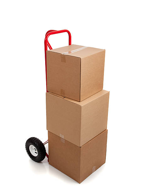 istock Stack of brown cardboard boxes on a hand truck, dolly 156268669