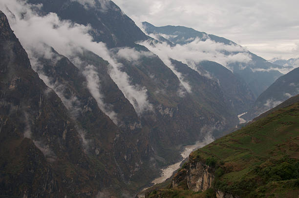 Tiger Leaping Gorge in morning clouds stock photo