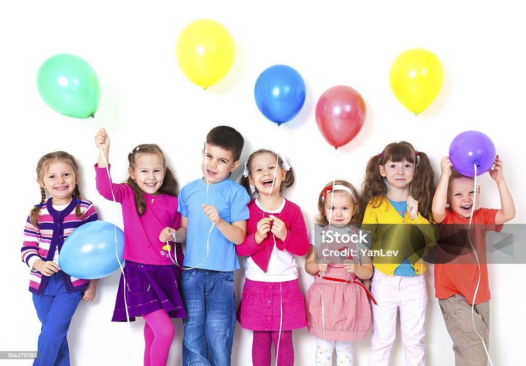 Felice bambini con palloncini - Foto stock royalty-free di Bambino