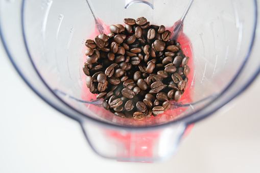 coffee bean in the food processor view from above