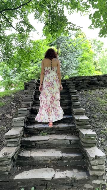 Young woman walking up the stairs
