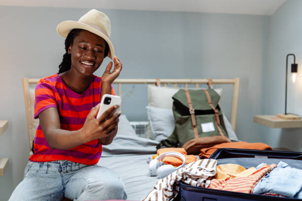 istock A young African American woman is taking a selfie while wearing a hat 1562740466