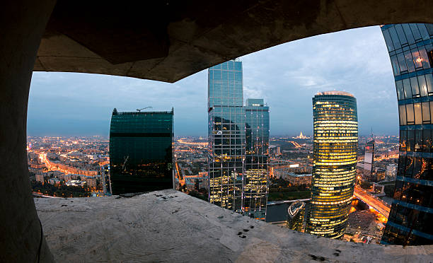 Moscow cityscape. Fisheye view from construction site http://www.mordolff.ru/is/_lb_moscow_cityscape_12.jpg panoramic riverbank architecture construction site stock pictures, royalty-free photos & images