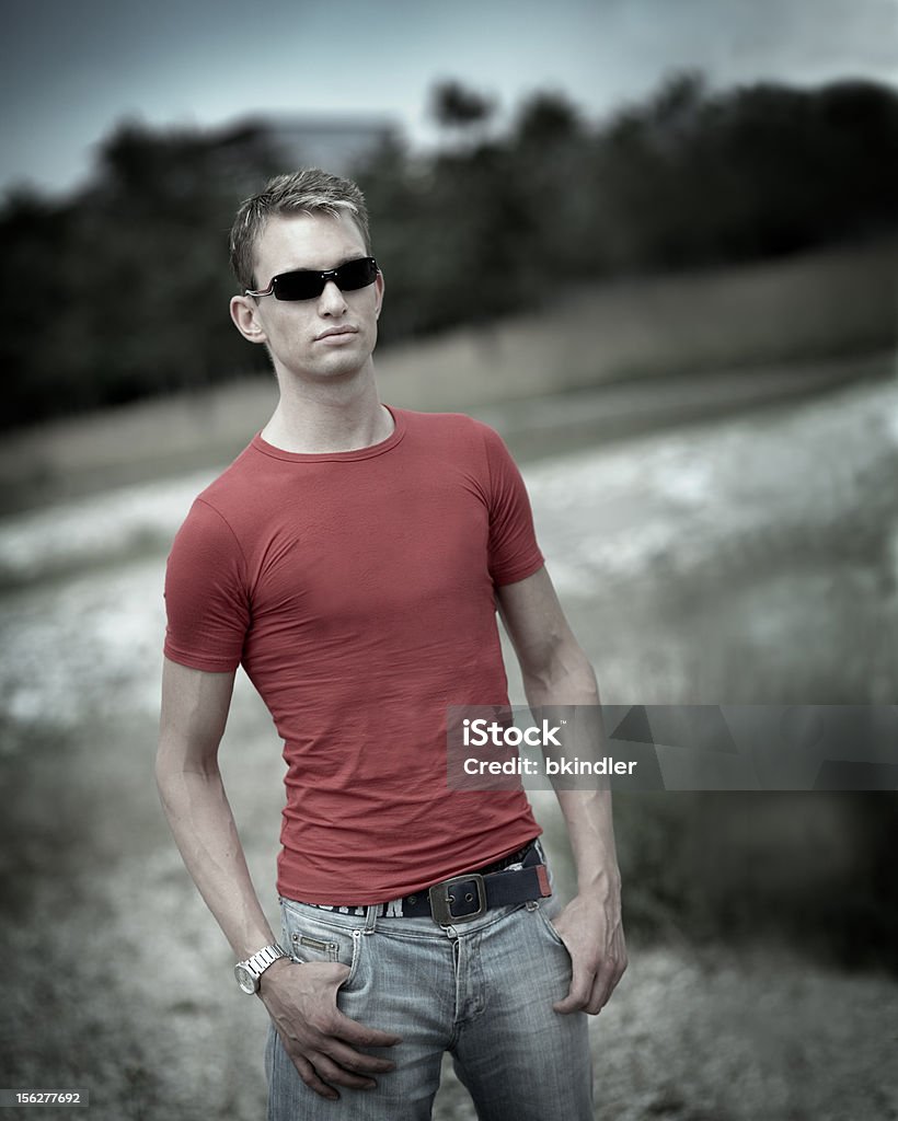 Portrait of Young Man Wearing Sunglasses Outside  Jeans Stock Photo