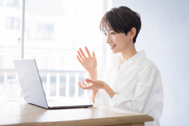A Japanese woman life scene, work, laptop.