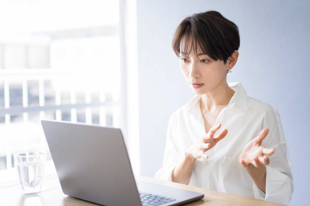 istock A Japanese woman life scene, work, laptop. 1562789943