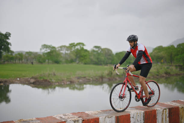 istock A  cyclist doing a cycling adventure on a Parapet 1562805855