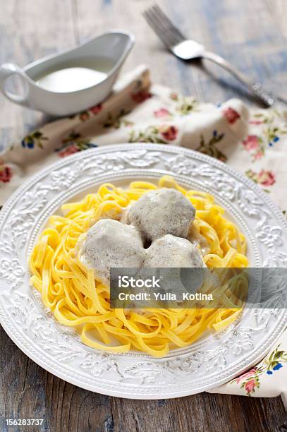 Meatballs With Tagliatelli And White Sauce Stock Photo - Download Image Now - Bechamel Sauce, Close-up, Cooked