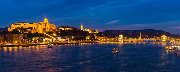 istock Night view of Budapest's lighted-up Buda Castle and Danube River in Hungary 1562840444
