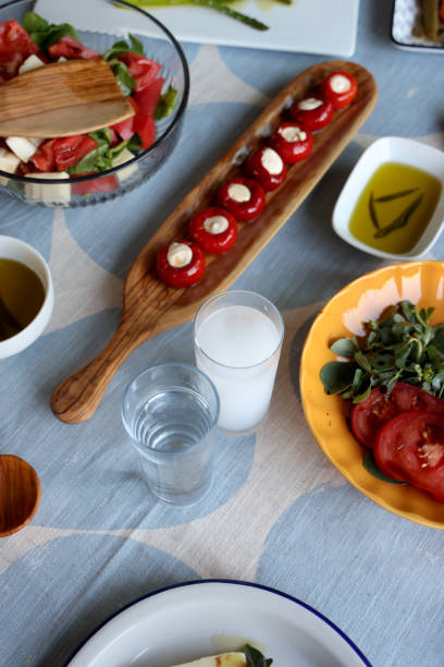 istock Raki or ouzo on a delicious table 1562857250