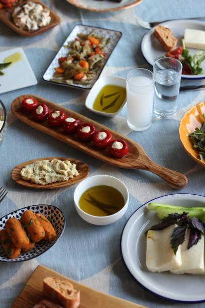 istock Raki or ouzo on a delicious table 1562858823