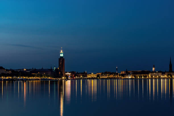 Stockholm, Sweden A view of the City Hall or Stadshuset at night in the summer.