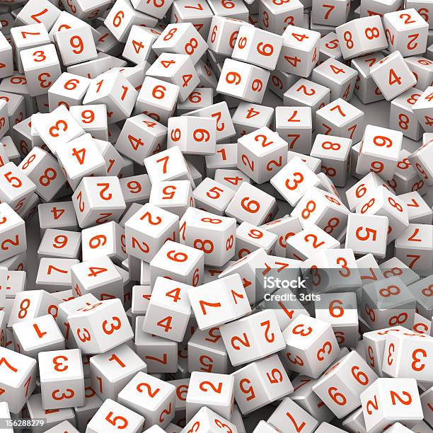 Numbers On Fallen White Cubes Stock Photo - Download Image Now - Block Shape, Chance, Chaos