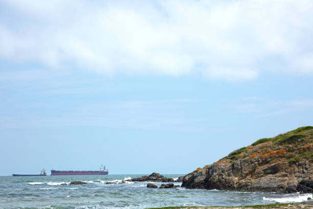 ships and cliffs in the open sea