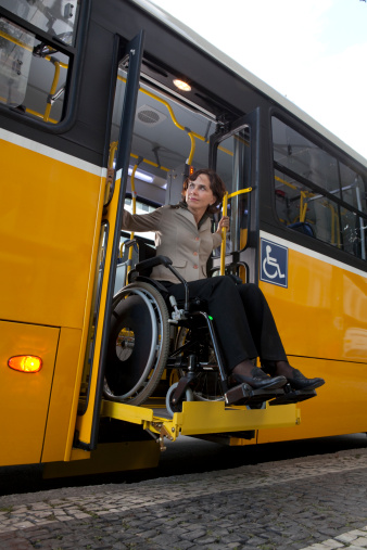 Lift-equipped bus for wheelchairs users, with exclusive space for wheelchair inside the vehicle