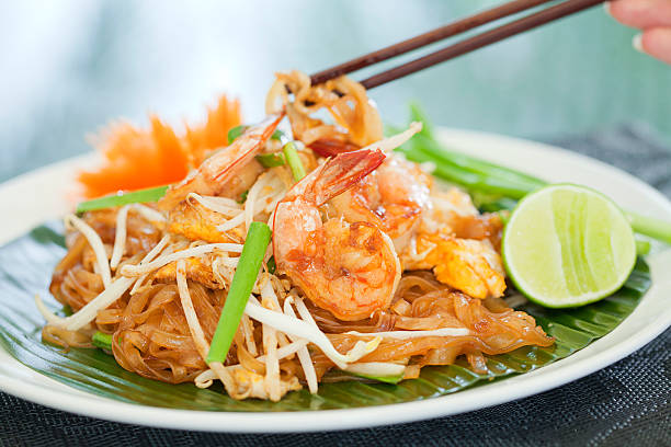 Pad Thai Authentic Thai cuisine, Pad Thai (Thai style noodles) thai food stock pictures, royalty-free photos & images