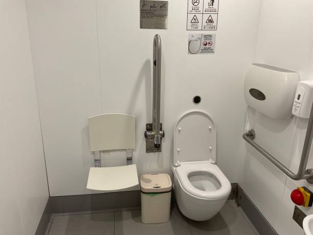 istock Folding chairs in toilet for the disabled 1562929872