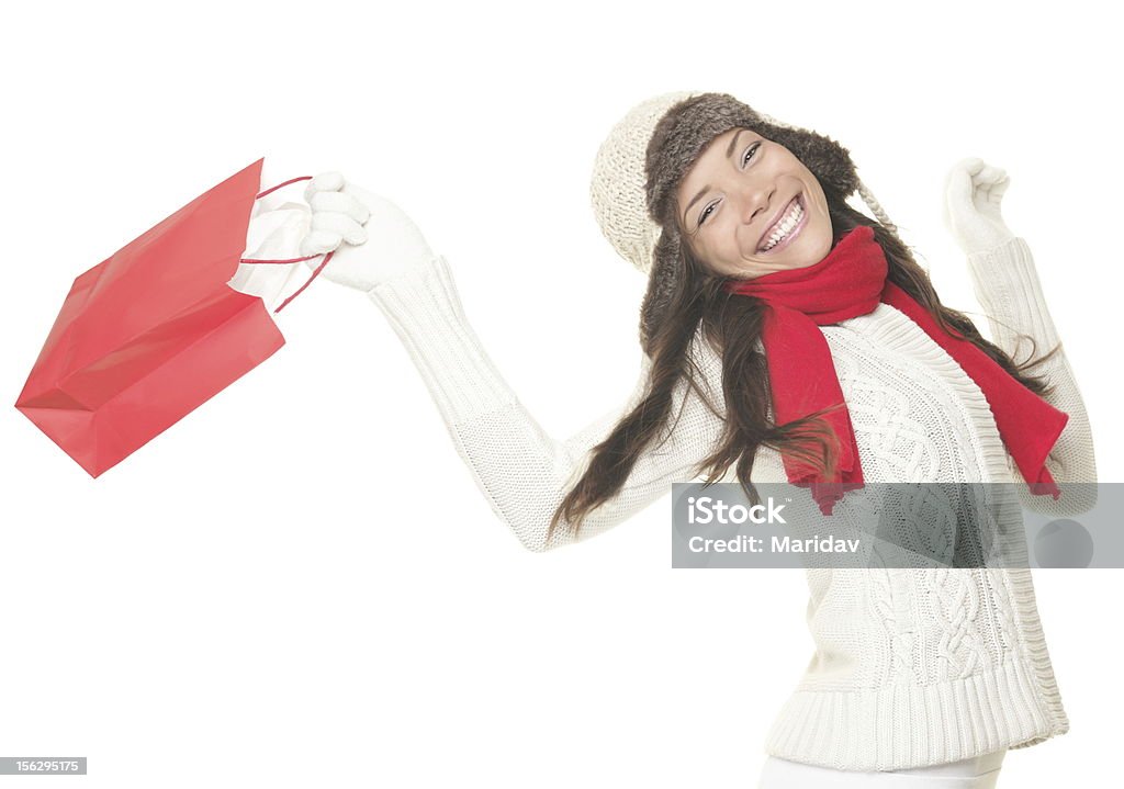 shopping de Noël femme avec un sac-cadeau - Photo de Femmes libre de droits