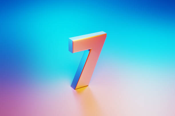 istock Metallic Number Seven Illuminated By Blue And Pink Lights On Blue And Pink Background 1562968018