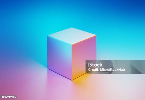 Metallic Cube Object Illuminated By Blue And Pink Lights On Blue And Pink Background Stock Photo - Download Image Now