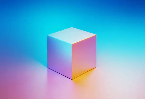 Metallic cube object illuminated by blue and pink lights on blue and pink background. Horizontal composition with copy space.