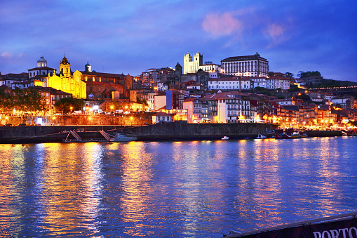 Porto cityscape over the Douro River at night, Portugal